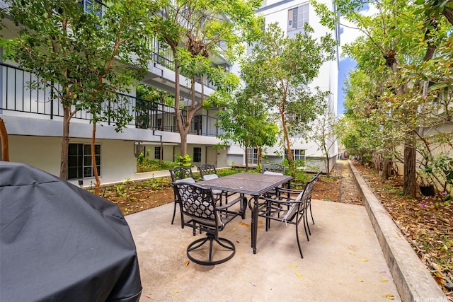 1433 Kewalo St Unit Ph12, Honolulu, HI 96822 - view of patio with outdoor dining area and area for grilling