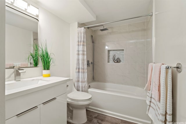 1433 Kewalo St Unit Ph12, Honolulu, HI 96822 - full bathroom with toilet, shower / tub combo, wood finished floors, and vanity