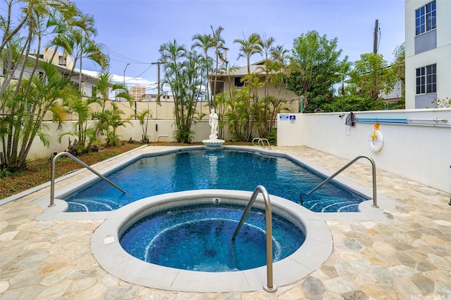 1433 Kewalo St Unit Ph12, Honolulu, HI 96822 - view of swimming pool featuring a fenced backyard, a fenced in pool, an in ground hot tub, and a patio area
