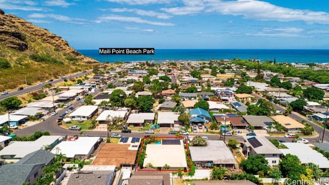 birds eye view of property featuring a water view and a residential view