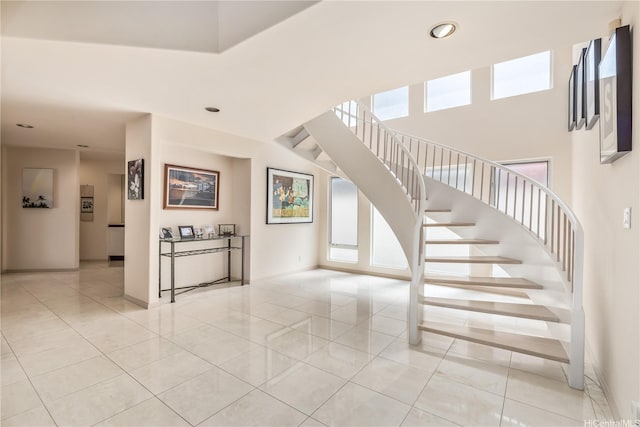 31 Poipu Dr, Honolulu, HI 96825 - stairway with baseboards, a wealth of natural light, and recessed lighting