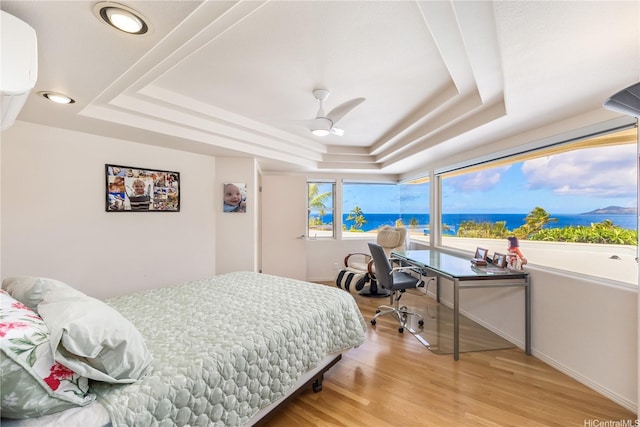 31 Poipu Dr, Honolulu, HI 96825 - bedroom featuring recessed lighting, a raised ceiling, light wood-style floors, and baseboards