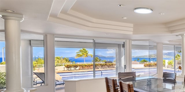 31 Poipu Dr, Honolulu, HI 96825 - dining room with plenty of natural light, a tray ceiling, and decorative columns