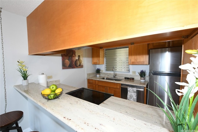 98-719 Iho Pl Unit 5/804, Aiea, HI 96701 - kitchen featuring dishwasher, freestanding refrigerator, brown cabinetry, black electric range, and light stone counters