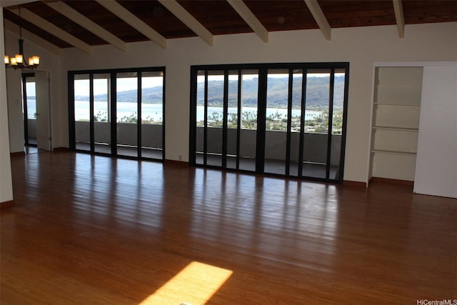 155 Polihale Pl, Honolulu, HI 96825 - empty room featuring plenty of natural light, a chandelier, and wood finished floors