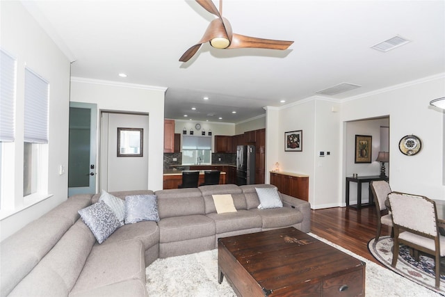 91-1317 Kaiokia St, Ewa Beach, HI 96706 - living area featuring a ceiling fan, visible vents, ornamental molding, recessed lighting, and dark wood-type flooring