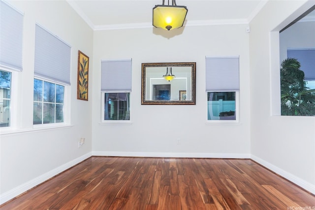 91-1317 Kaiokia St, Ewa Beach, HI 96706 - spare room with baseboards, ornamental molding, and wood finished floors