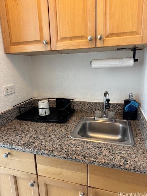 1920 Ala Moana Blvd Unit 1210, Honolulu, HI 96815 - kitchen view of a sink and a textured wall