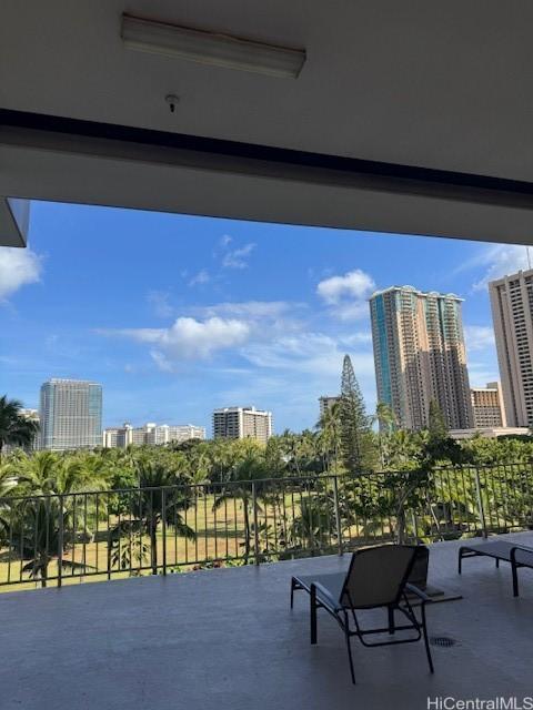 1920 Ala Moana Blvd Unit 1210, Honolulu, HI 96815 - view of patio / terrace featuring a view of city and a balcony