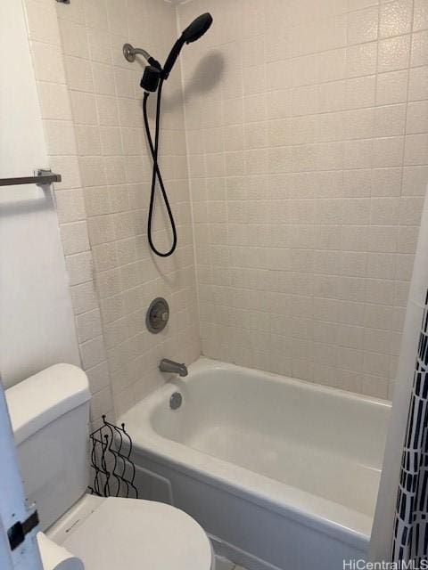 1920 Ala Moana Blvd Unit 1210, Honolulu, HI 96815 - bathroom with toilet and shower / tub combo with curtain