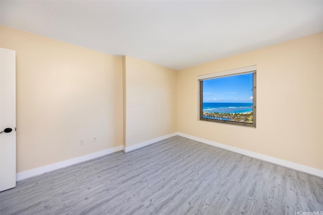 1551 Ala Wai Blvd Unit 2903, Honolulu, HI 96815 - unfurnished room featuring baseboards and wood finished floors