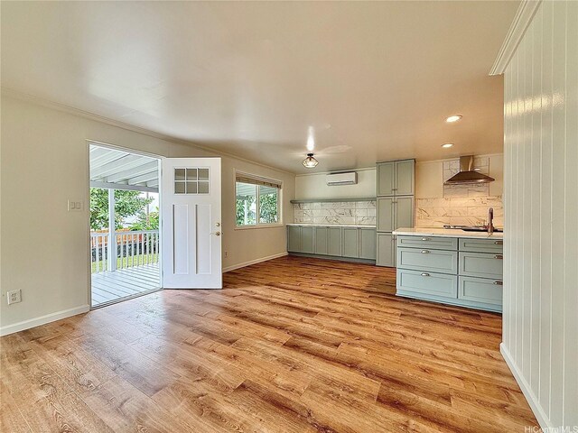 47-104 Hunaahi St, Kaneohe, HI 96744 - unfurnished living room with crown molding, light wood-style floors, and recessed lighting