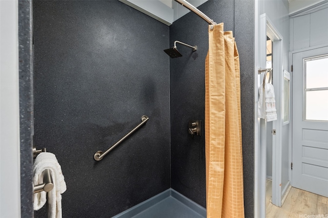 1230 Hoohulu St, Pearl City, HI 96782 - bathroom with curtained shower and wood finished floors