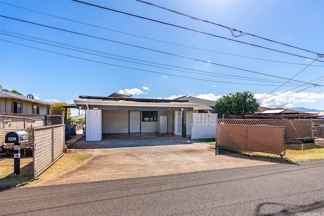 1230 Hoohulu St, Pearl City, HI 96782 - view of front of property with driveway and an attached carport
