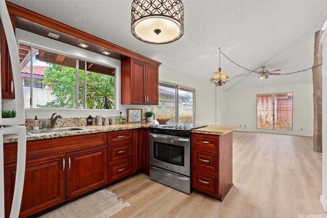 94-441 Kauopua St, Mililani, HI 96789 - kitchen featuring stainless steel electric range oven, a sink, light wood-type flooring, a peninsula, and reddish brown cabinets