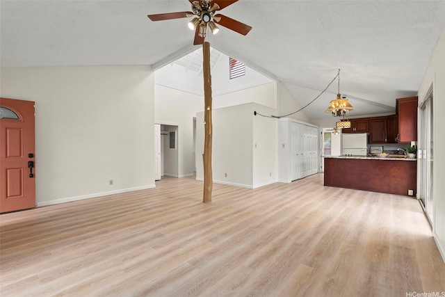 94-441 Kauopua St, Mililani, HI 96789 - unfurnished living room with ceiling fan, light wood finished floors, baseboards, and high vaulted ceiling