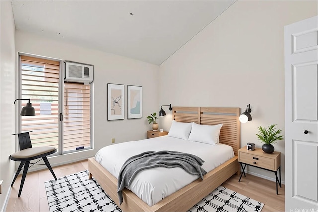 94-441 Kauopua St, Mililani, HI 96789 - bedroom with a wall unit AC, lofted ceiling, and light wood-style floors