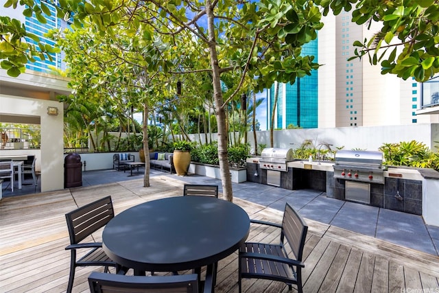 1189 Waimanu St Unit 2803, Honolulu, HI 96814 - wooden deck with outdoor dining area