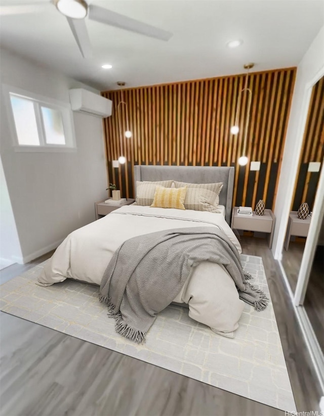 362 Waiopua Pl, Honolulu, HI 96825 - bedroom featuring wood finished floors, a wall mounted air conditioner, baseboards, and recessed lighting