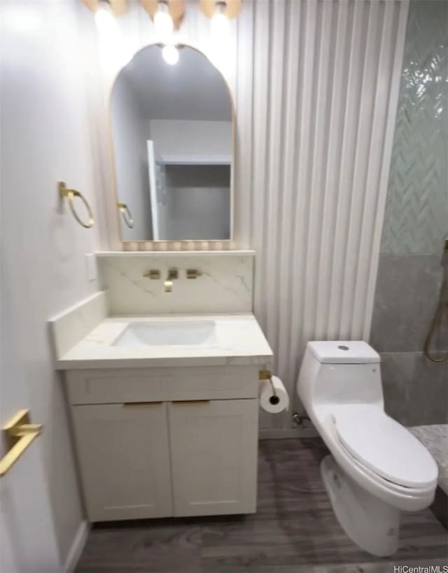 362 Waiopua Pl, Honolulu, HI 96825 - bathroom featuring toilet, vanity, and wood finished floors