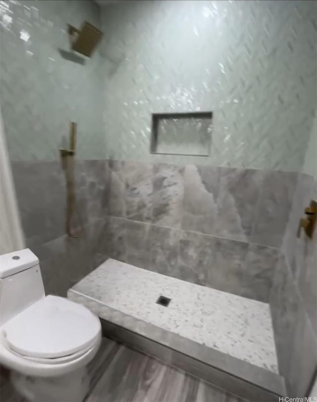 362 Waiopua Pl, Honolulu, HI 96825 - full bath featuring toilet, a tile shower, and wood finished floors