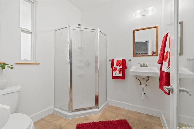2107 Makanani Dr, Honolulu, HI 96817 - full bathroom featuring toilet, a stall shower, a sink, and baseboards