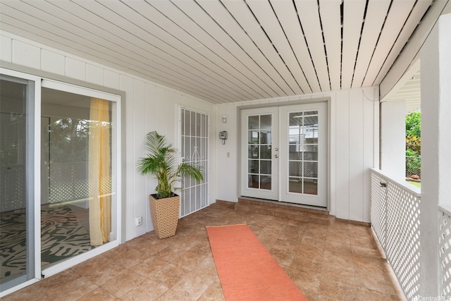 2107 Makanani Dr, Honolulu, HI 96817 - view of exterior entry with board and batten siding and french doors