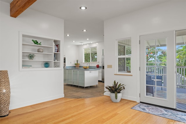 2107 Makanani Dr, Honolulu, HI 96817 - interior space with beam ceiling, baseboards, recessed lighting, and wood finished floors