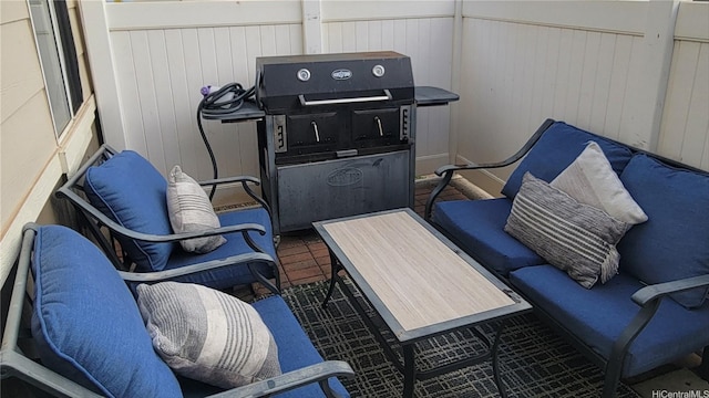 balcony with outdoor lounge area and a grill