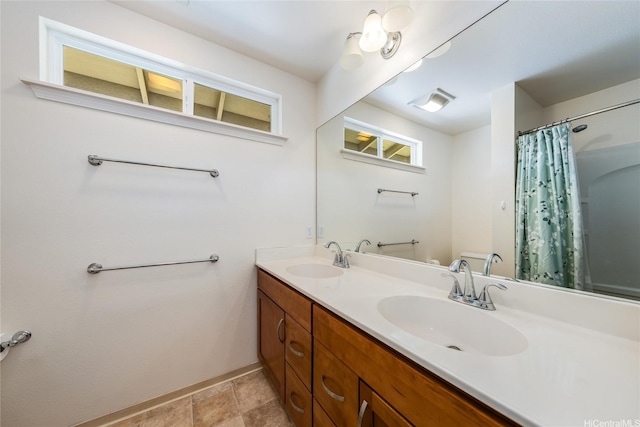 87-1801 Mokila St, Waianae, HI 96792 - bathroom featuring a sink, toilet, double vanity, and a shower with shower curtain