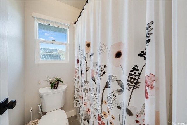 91-1180 Waiemi St, Ewa Beach, HI 96706 - bathroom featuring toilet, curtained shower, and baseboards