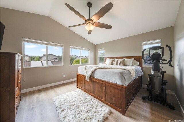 91-1180 Waiemi St, Ewa Beach, HI 96706 - bedroom featuring lofted ceiling, multiple windows, light wood-type flooring, baseboards, and ceiling fan