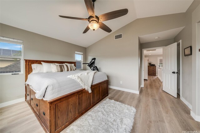 91-1180 Waiemi St, Ewa Beach, HI 96706 - bedroom featuring light wood-style flooring, vaulted ceiling, multiple windows, baseboards, and ceiling fan