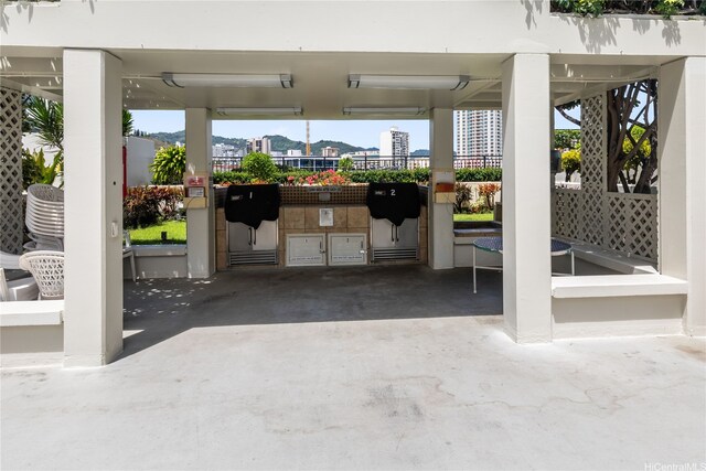 876 Curtis St Unit 3208, Honolulu, HI 96813 - view of patio featuring an outdoor kitchen and a view of city