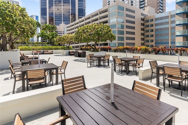 876 Curtis St Unit 3208, Honolulu, HI 96813 - view of community with outdoor dining area, a view of city, and a patio