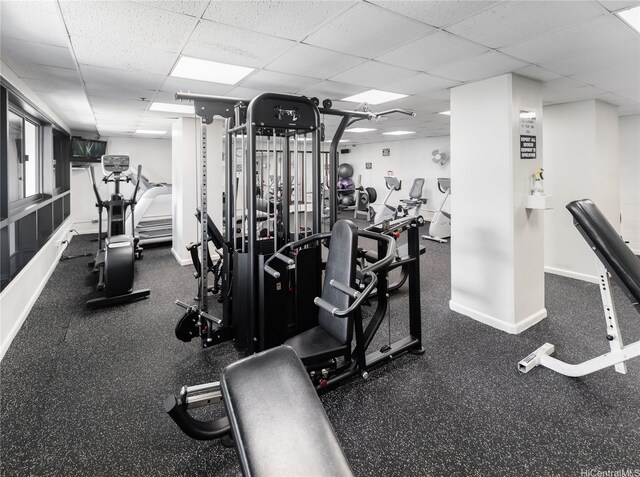 876 Curtis St Unit 3208, Honolulu, HI 96813 - workout area featuring a paneled ceiling and baseboards