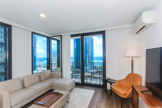 987 Queen St Unit 2102, Honolulu, HI 96814 - living area with expansive windows, a wall mounted air conditioner, wood finished floors, a water view, and recessed lighting