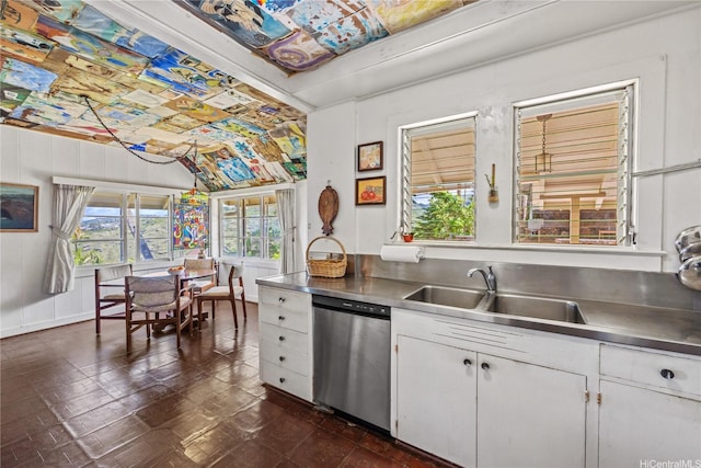 3637 Nihipali Pl, Honolulu, HI 96816 - kitchen with stainless steel counters, stainless steel dishwasher, and white cabinetry