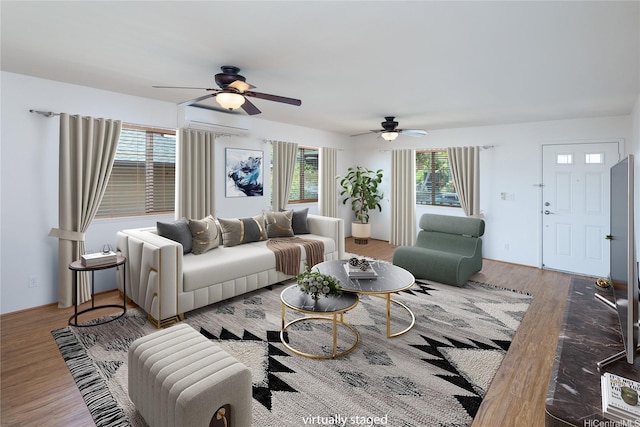 92-1199 Pueonani St, Kapolei, HI 96707 - living area featuring a ceiling fan and wood finished floors