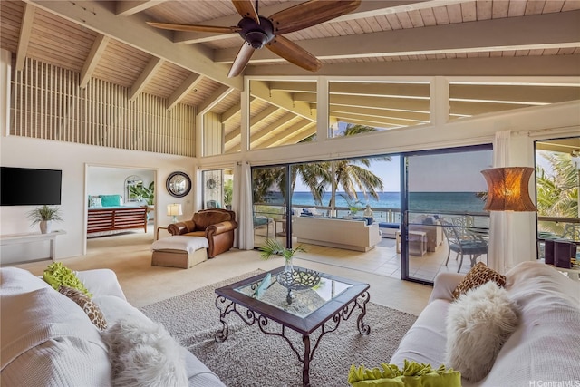 living room with a water view, a wealth of natural light, and wooden ceiling