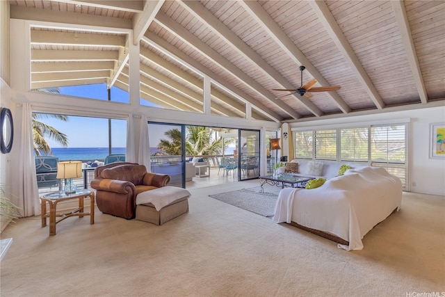 sunroom / solarium featuring wooden ceiling, carpet flooring, and beamed ceiling