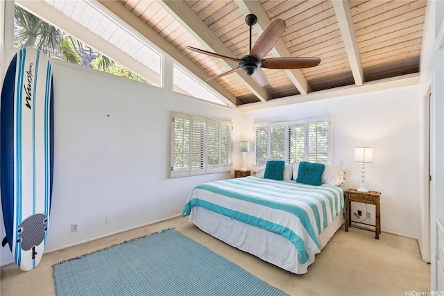carpeted bedroom with a ceiling fan, wood ceiling, baseboards, and vaulted ceiling with beams