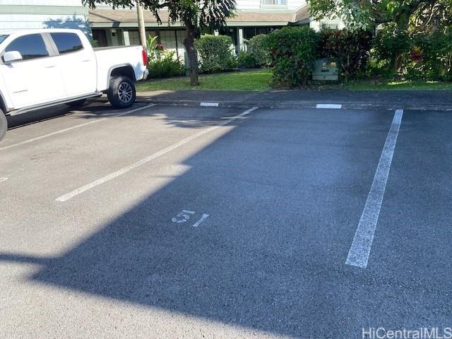 view of uncovered parking lot