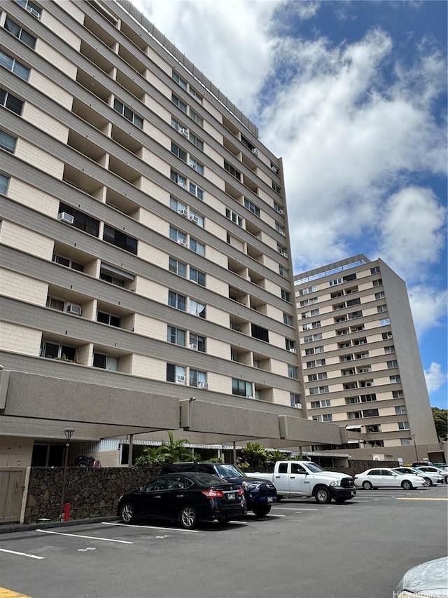 3215 Ala Ilima St Unit A303, Honolulu, HI 96818 - view of building exterior with uncovered parking