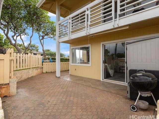 94-546 Kupuohi St Unit 104, Waipahu, HI 96797 - view of patio / terrace with a balcony and fence