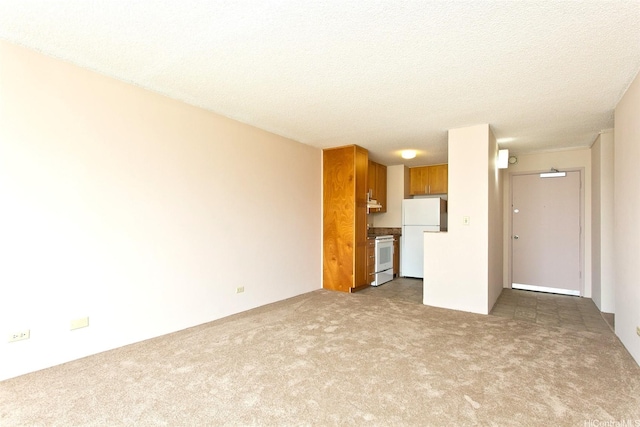 3161 Ala Ilima St Unit 1515, Honolulu, HI 96818 - unfurnished living room featuring carpet floors and a textured ceiling