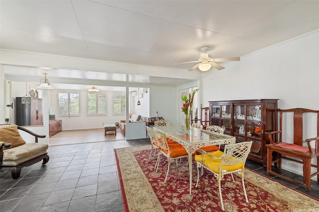 2168 Round Top Dr, Honolulu, HI 96822 - dining room with a ceiling fan and crown molding