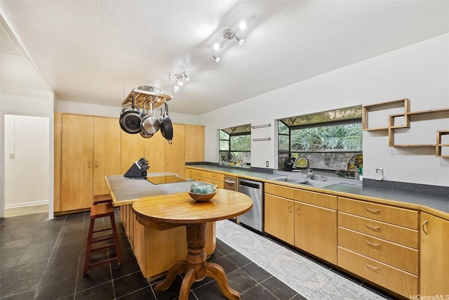 2168 Round Top Dr, Honolulu, HI 96822 - kitchen featuring stainless steel dishwasher, dark tile patterned floors, open shelves, dark countertops, and a sink