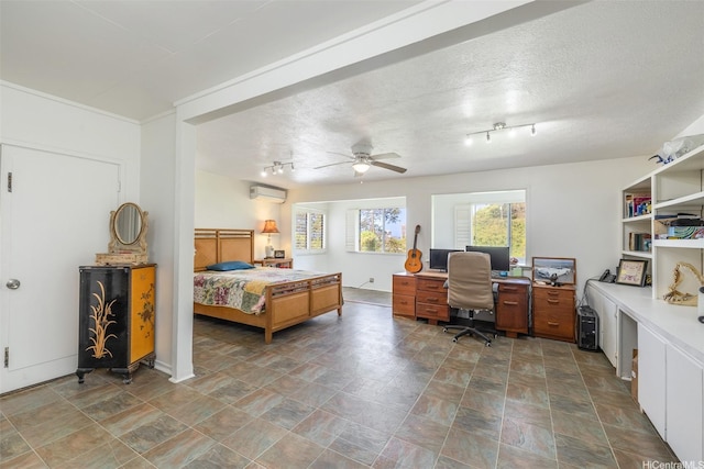 2168 Round Top Dr, Honolulu, HI 96822 - bedroom with an AC wall unit, a ceiling fan, rail lighting, and stone finish flooring
