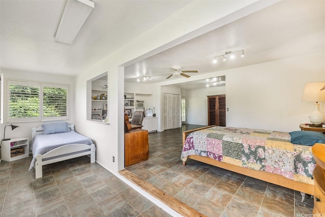 2168 Round Top Dr, Honolulu, HI 96822 - bedroom with ceiling fan and stone finish floor